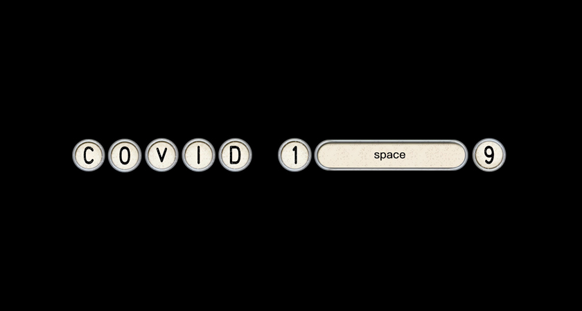 Covid-19 in de letters van een oude typemachine, met een lange spatie "space" tussen de 1 en de 9
